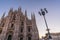 Close up of Duomo di Milano church in the early morning during sunrise, Milan Italy