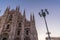 Close up of Duomo di Milano church in the early morning during sunrise, Milan Italy