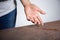 Close-up of dust on woman finger