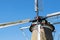 Close up dutch windmill with blue bright sky