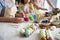 Close up of dyeing Easter eggs in the family circle