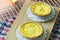 Close up Egg tarts on cooling rack. Wooden background. Portuguese Egg Tarts, is a kind of custard tart