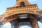 Close-up of the Eiffel tower in Paris with blue sky