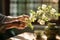 Close up of an elderly Japanese woman\\\'s hands arranging a small ikebana flower.