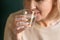 Close up of elderly woman drinking pure mineral water
