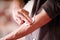 Close-up with electrostimulator electrodes in the arm of a fitness young man in a blurred background