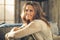 Close-up of elegant woman in a loft living