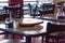 Close-up empty wooden table with rotating serving plate and shaker seasonings