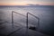 Close up of entrance sea barrier in Piran in sunset in long exposure, Slovenia