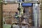 Close up of equipments in modern interior of brewery. Manufacturable process of brewage. Pipes, switchers and tubes junctions in a