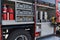 Close-up of essential firefighting equipment on a modern firetruck, showcasing tools and gear ready for emergency