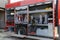 Close-up of essential firefighting equipment on a modern firetruck, showcasing tools and gear ready for emergency