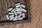 Close-up of ester-c tablets on a wooden background.  biologically active supplements topview photo