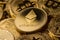 Close up of ethereum on a stack of bitcoin golden coins