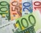 Close up of Euro banknotes with 100 Euros in focus