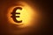 Close-up of Euro currency icon in yellow tunnel