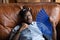 Close up exhausted African American man waving paper fan