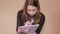 Close-up of an exhausted young woman working or preparing for her exam