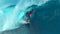 CLOSE UP: Experienced male surfer gets almost swept by a large barrel wave.