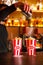 Close-up of expert bartender making popcorn cocktail in bar. Bartender finishes preparation of orange alcoholic popcorn cocktail b