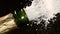 Close-up of explosion of champagne bottle