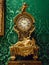 Close up of exquisite French 18th Century clock with ornate background