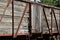 Close up exterior view of an old 19th Century railroad train boxcar