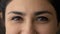 Close up of eyes of Indian woman smiling