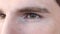 Close up of eyes of inquisitive, puzzled caucasian man looking around