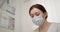 Close-up Face Of A Doctor Woman In A Protective Mask, A Medical Mask. Medic During Work. Researcher. Doctor or nurse is