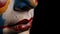 A close up of a face painted with clown makeup and red lips, AI