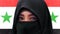 Close up face portrait of beautiful Muslim woman in traditional Islam burqa or burka head scarf posing cheerful and happy smiling