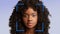 Close up of face recognition with modern technology, portrait of serious millennial african american woman