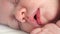 Close up. face of sleeping newborn. mode of day, healthy sleep in newborns.