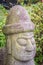 Close up face of the stone idol Dolharubang