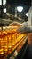 Close up of factory worker in white coat holding oil bottle near conveyor