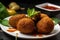 Close-up of falafel balls freshly fried and drizzled with a sweet and spicy harissa sauce on a white plate