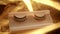 Close-up of false eyelashes. Beautiful fake eyelashes with rhinestones on gold fabric. Beauty, makeup, cosmetic, extension