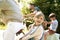 Close up of family riding bicycles in woods