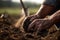 close-up of farmer& x27;s hands, tilling the soil and preparing for a new season