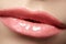 Close-up fashion lips with tender gloss make-up