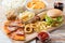 Close up of fast food snacks and drink on table