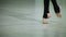 Close-up feet of ballerina in pointe performs dance ballet elements and different exercises in sport gy