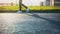 Close-up of feet of teenager passing along road