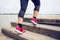 Close up feet of woman running exercise up staircase