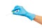 Close up of female doctor\'s hand in blue sterilized surgical glove with green plastic catheter against white