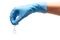 Close up of female doctor\'s hand in blue sterilized surgical glove holding transparent white glass ampoule with a drug