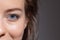 Close-up female face isolated on white studio background. Beautiful eyelashes and eyebrows. Concept of beauty.