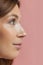 Close-up female face. Side view. Beautiful eyelashes and eyebrows. Concept of natural beauty, cosmetics, anti age