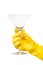 Close up of female hand in yellow protective rubber glove holding clean transparent martini glass